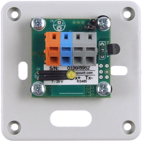 TQS3I thermometer withou the cover lid. Mounting holes are in corners. There are two holes for wiring in the middle.